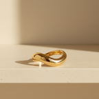 Gold ring on a white background