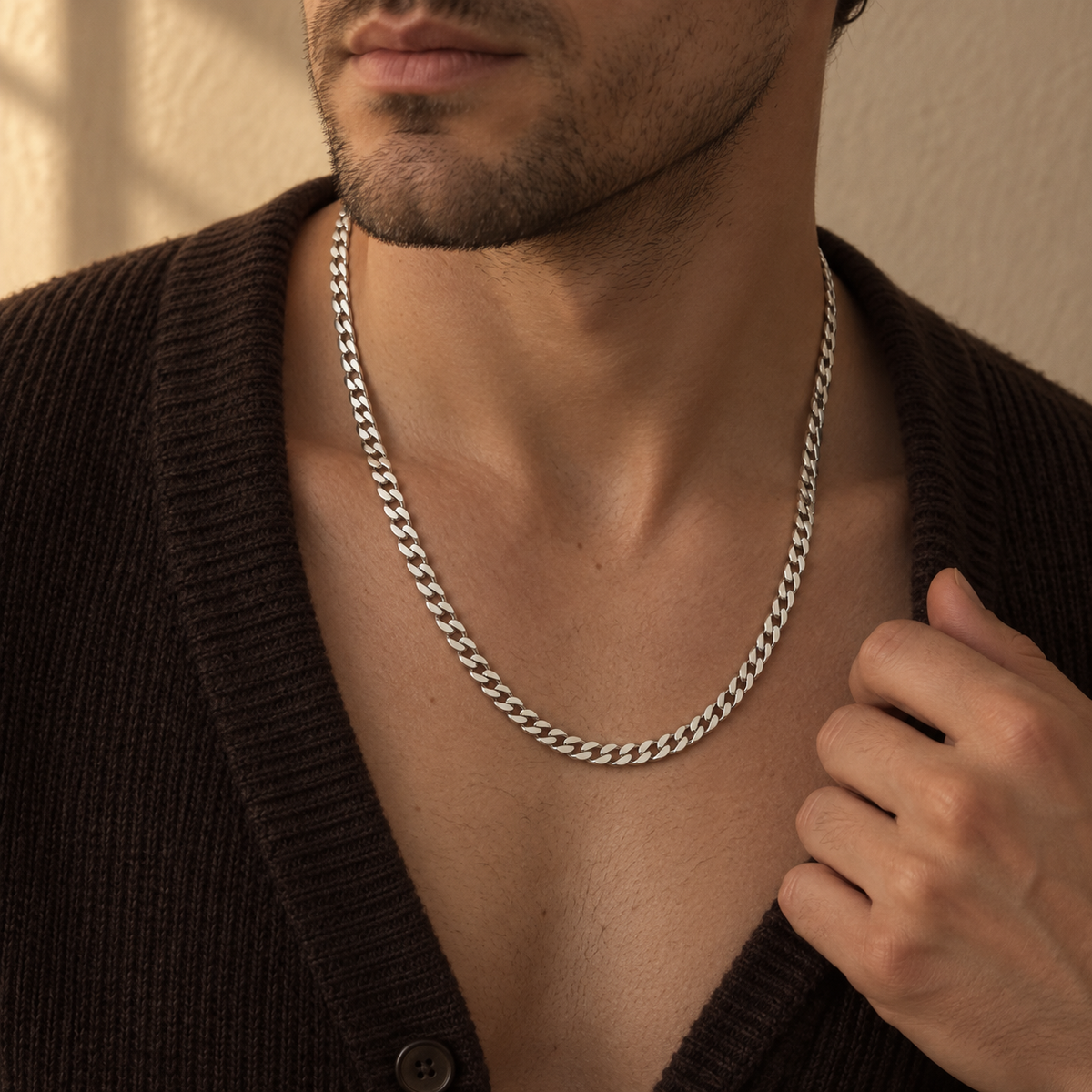 REGENT Cuban chain necklace styled with an espresso knit cardigan