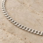 Close-up of REGENT's flat polished 925 sterling silver Cuban curb links
