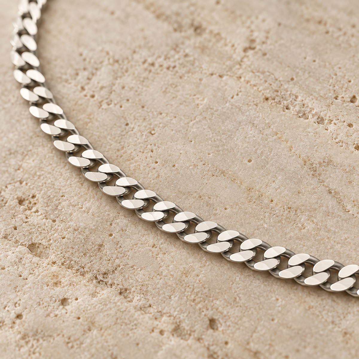 Close-up of REGENT's flat polished 925 sterling silver Cuban curb links